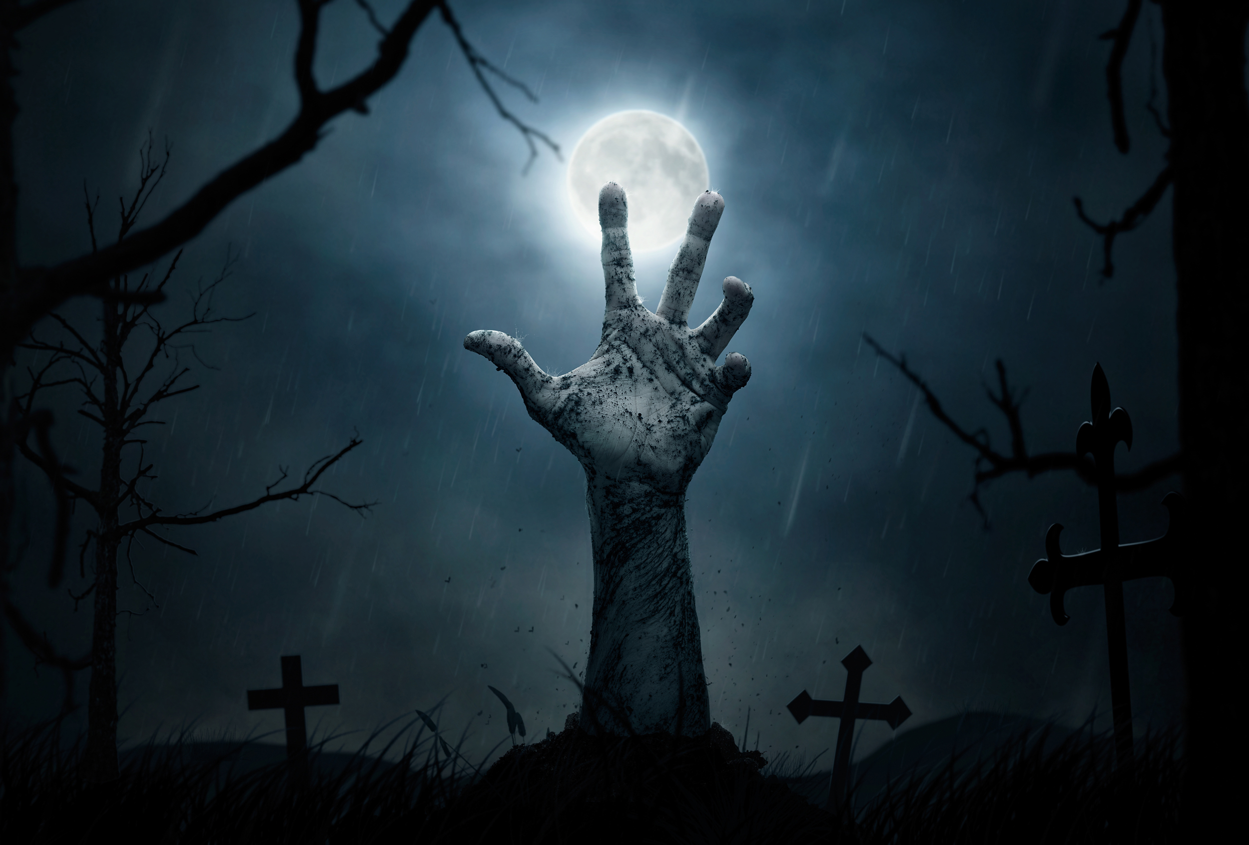 Halloween, dead hand coming out from the soil